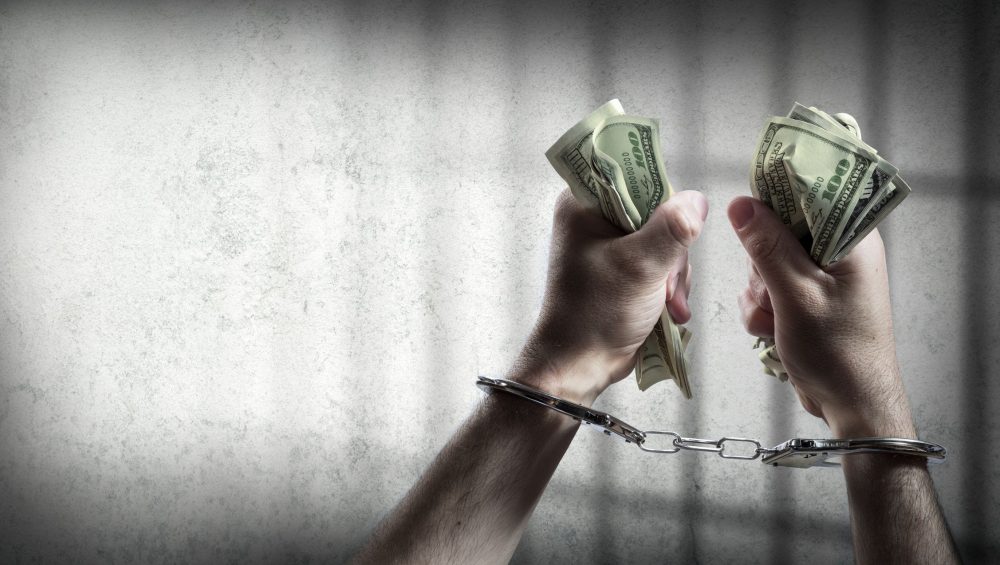 Debt and Prison: What Happens to Debt When You Go to Jail?